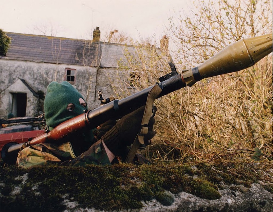 A Volunteer of the Irish Republican Army armed with an RPG-7 rocket-launcher, British Occupied North of Ireland, 1994