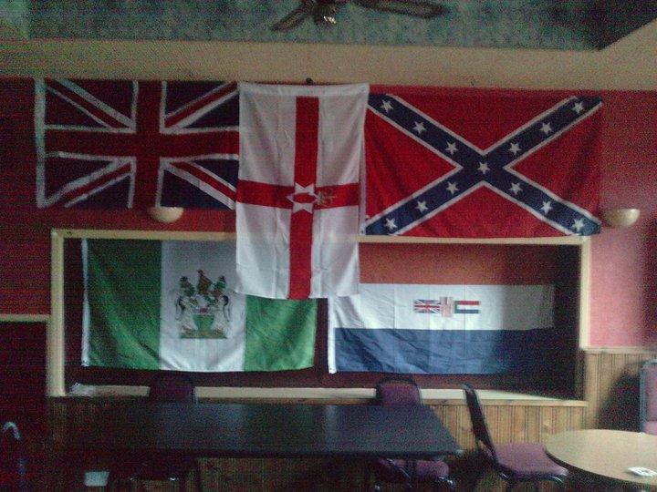 The British Unionist minority in Ireland displays the banners of racist regimes from across history, including British Rhodesia, Apartheid South Africa and the Confederate States