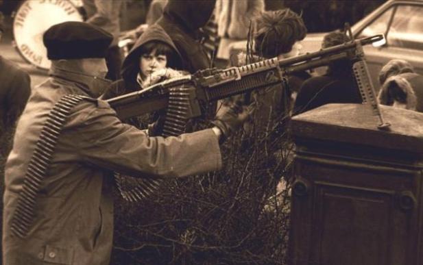 AVolunteer of the Derry Brigade of the Irish Republican Army armed with an M60 general-purpose machine gun