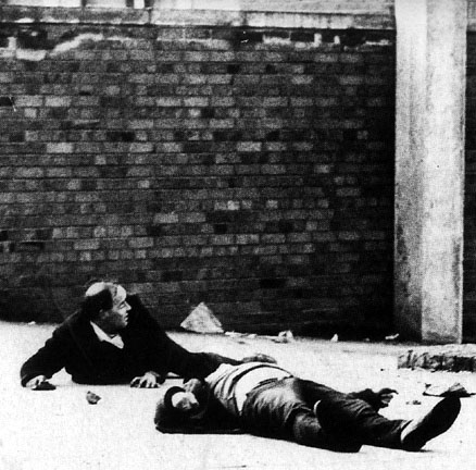 The Bloody Sunday Massacre. The dead and the wounded lie on the streets of the Irish city of Derry following a British Army attack on a civil rights march, January 30th 1972 The Bloody Sunday Massacre. The dead and the wounded lie on the streets of the Irish city of Derry following a British Army attack on a civil rights march, January 30th 1972