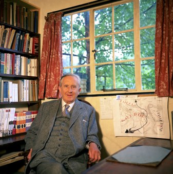 J.R.R. Tolkien in his study with a map of Middle-earth