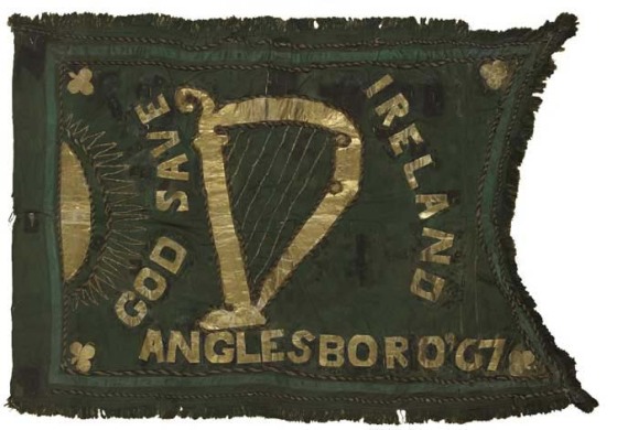 An Irish or Fenian Sunburst flag featuring the harp with the sunburst to the left, Ireland 1867
