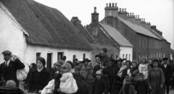 A column of Irish refugees fleeing the ruins of their homes following the Sack of Balbriggan