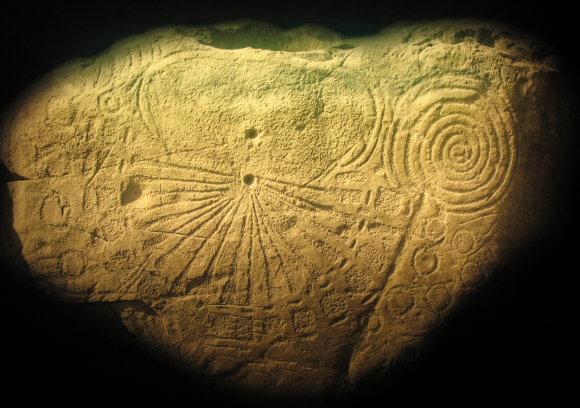 One of the carved stones at the ancient Brú na Bóinne burial mound. A 4000 year old Irish Sunburst? Almost certainly not but an interesting artistic parallel 