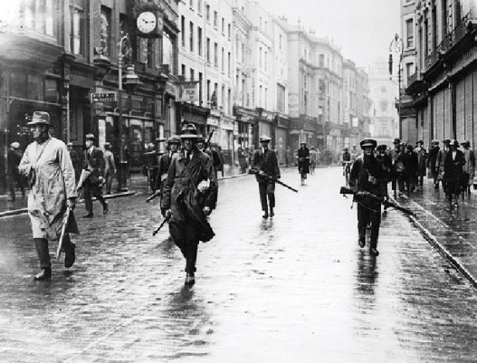 Volunteers of the Irish Republican Army move through Grafton Street, the Battle of Dublin, 1922
