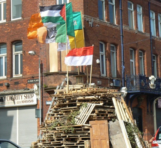 Irish, Polish, Palestinian and Vatican flags ready to be burned by British Unionists, Belfast, Ireland 2013