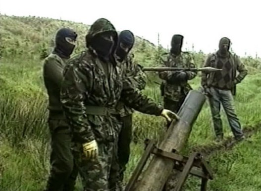 French TV crew are shown a mortar being prepared for an attack by a Volunteer of the Irish Republican Army, British Occupied North of Ireland, early 1990s French TV crew are shown a mortar being prepared for an attack by a Volunteer of the Irish Republican Army, British Occupied North of Ireland, early 1990s