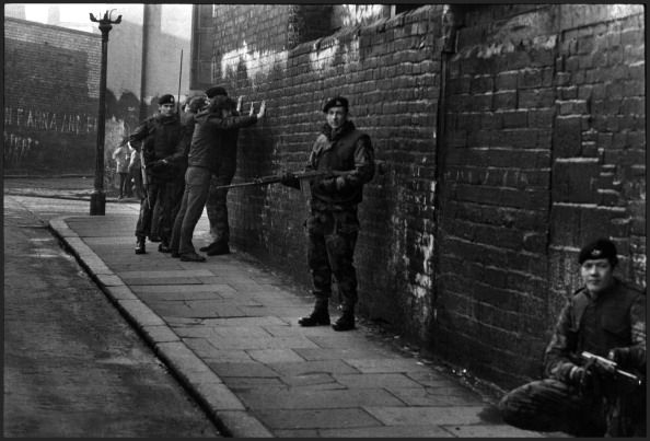 Soldiers of the British Army's Gloucestershire Regiment interrogating and searching local Irish civilians, West Belfast, Ireland, March 1972