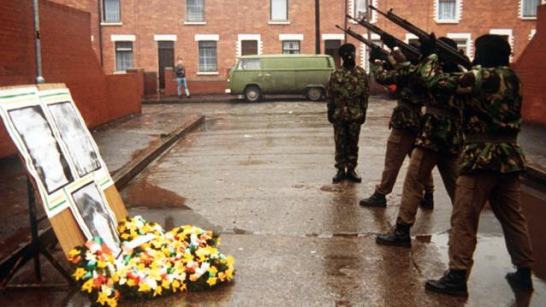 Volunteers of the Irish Republican Army fire a volley of shots in tribute to the so-called Gibraltar Three, unarmed IRA Volunteers Seán Savage, Daniel McCann and Mairéad Farrell who were killed by British Special Forces in 1988