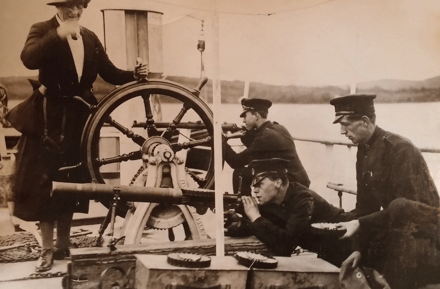 Mrs Laverton, owner of the steam-yacht Pandora, pictured with USC militiamen in the aftermath of the Battle of Pettigo and Belleek, Ireland, 1922