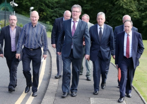 Billy Hutchinson, Mike Nesbitt and Peter Robinson. The leaders of the UUP and DUP step side-by-side with the leaders of the British terrorist-linked PUP