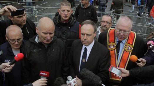 PUP leader Billy Hutchinson, senior DUP politician Nigel Dodds and Mervyn Gibson of the Orange Order