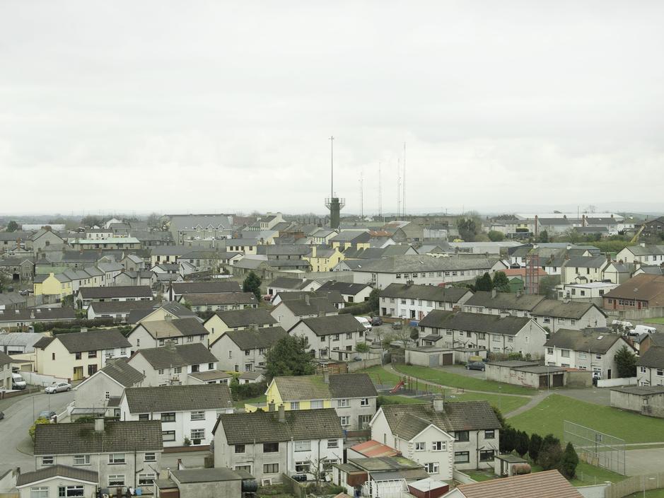 Civilian homes provide human shields for the British soldiers confined to the fortified UK military outpost in Crossmaglen, Occupied North of Ireland