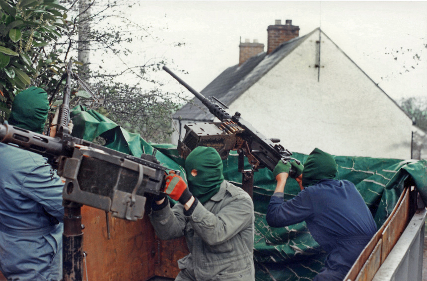 Volunteers of the South Fermanagh Brigade, Irish Republican Army, man American-supplied M2 Browning .50 Calibre heavy machine guns on the rear of an improvised fighting vehicle, February 1977