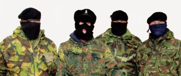 Volunteers of the Irish insurgent grouping, Óglaigh na hÉireann or ÓnaÉ, in a press conference