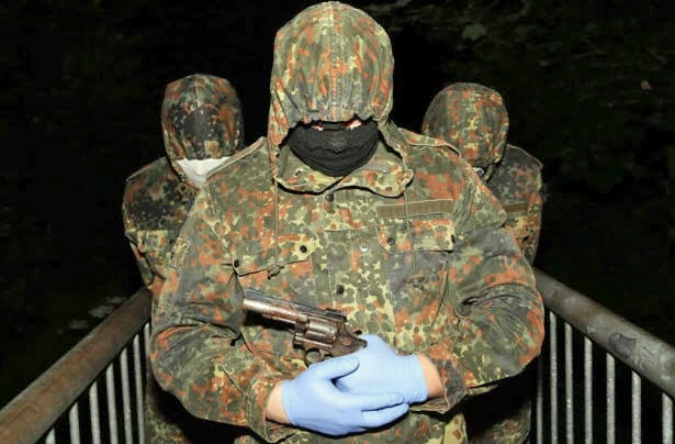 Volunteers of the Irish insurgent grouping, Óglaigh na hÉireann or ÓnaÉ, pose for the camera in County Derry, UK Occupied North of Ireland